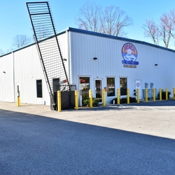 Self storage facility with secure gate