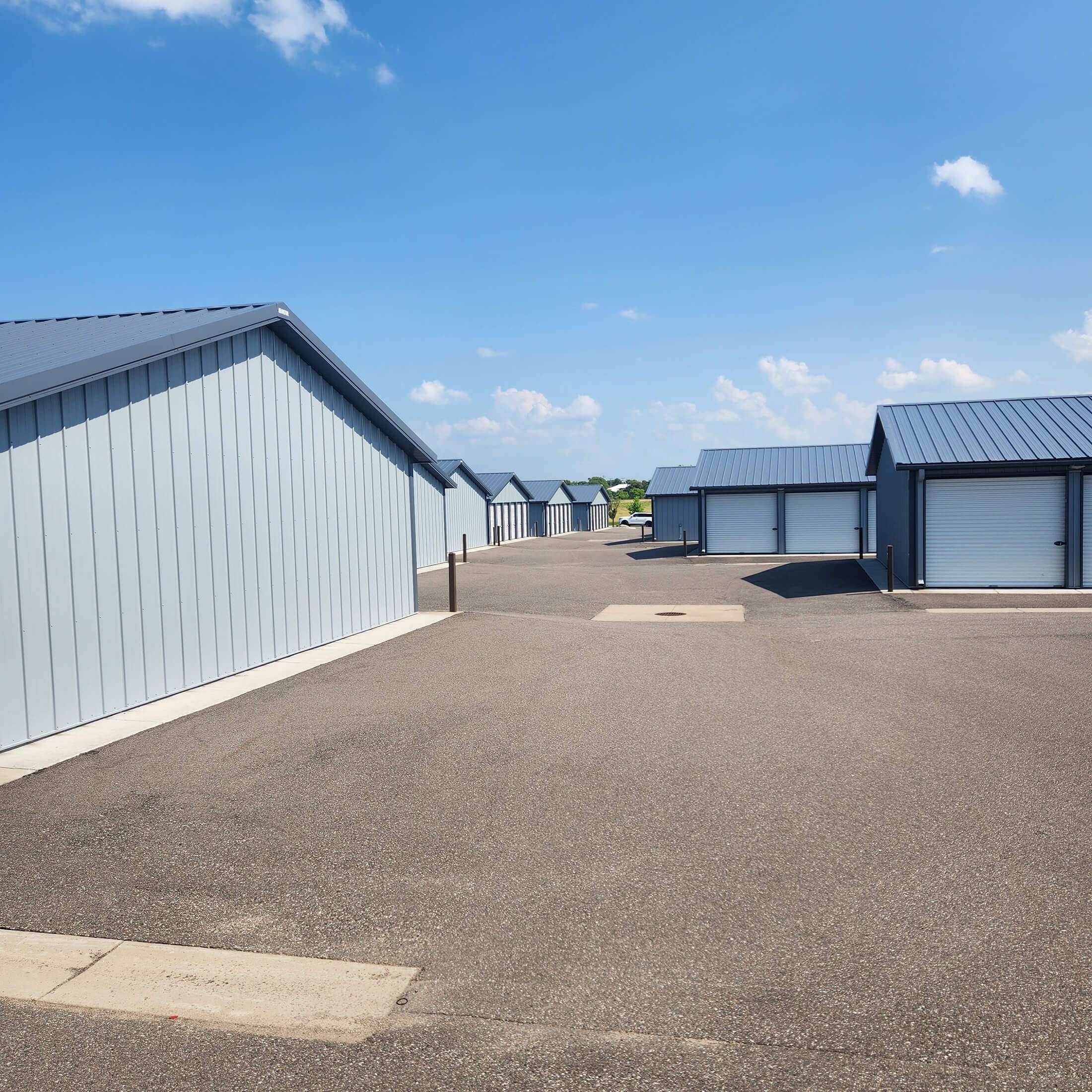 wide paved aisles at self storage facility