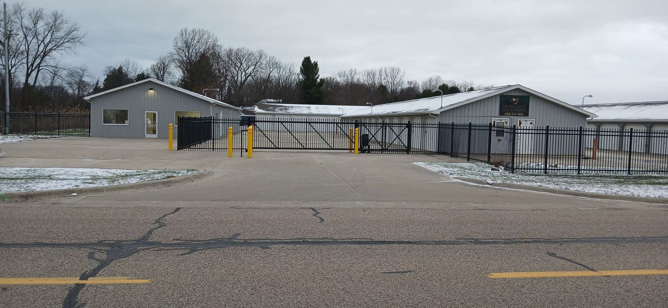 Closed entrance gate at a self storage facility
