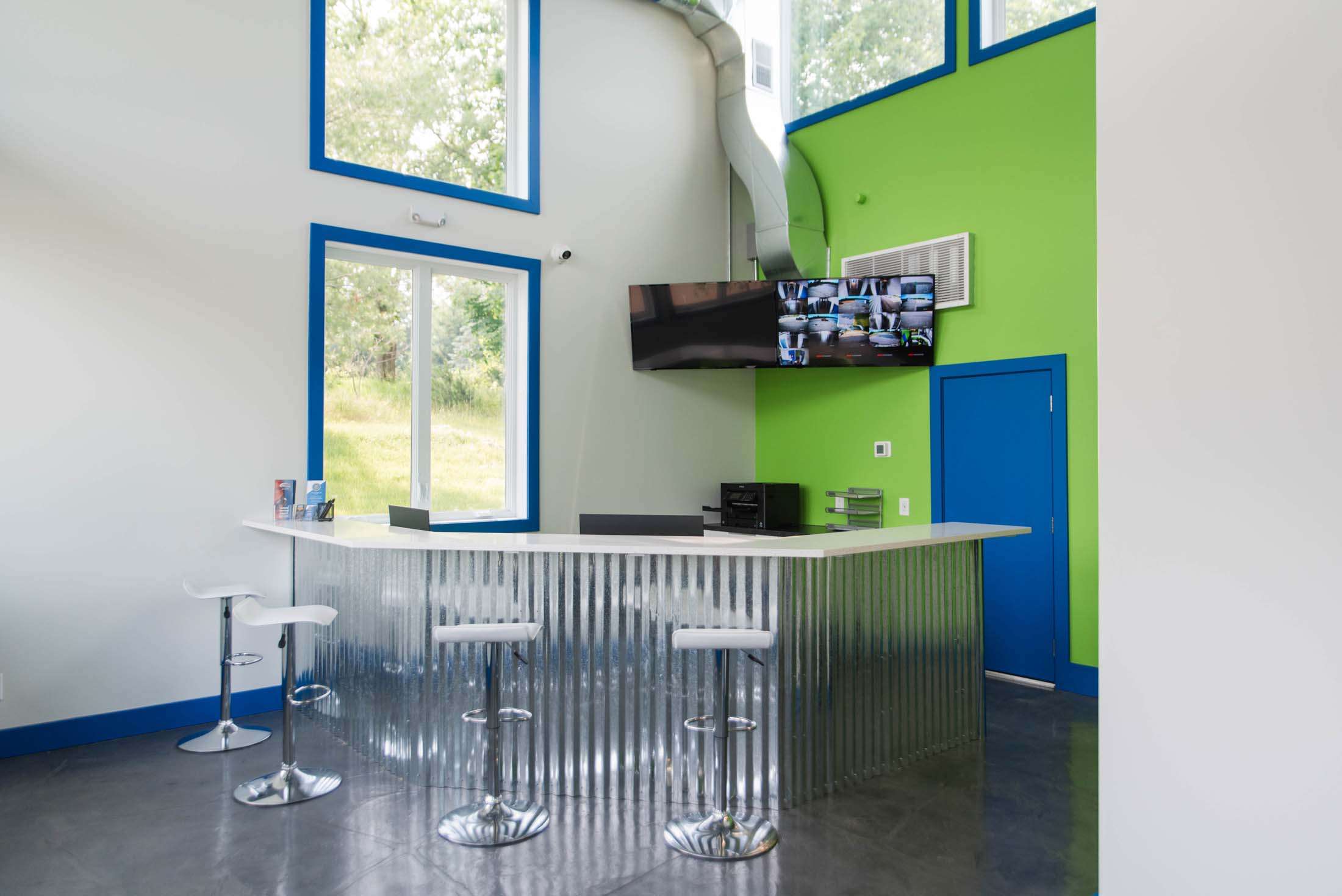 Storage rental office and security monitors