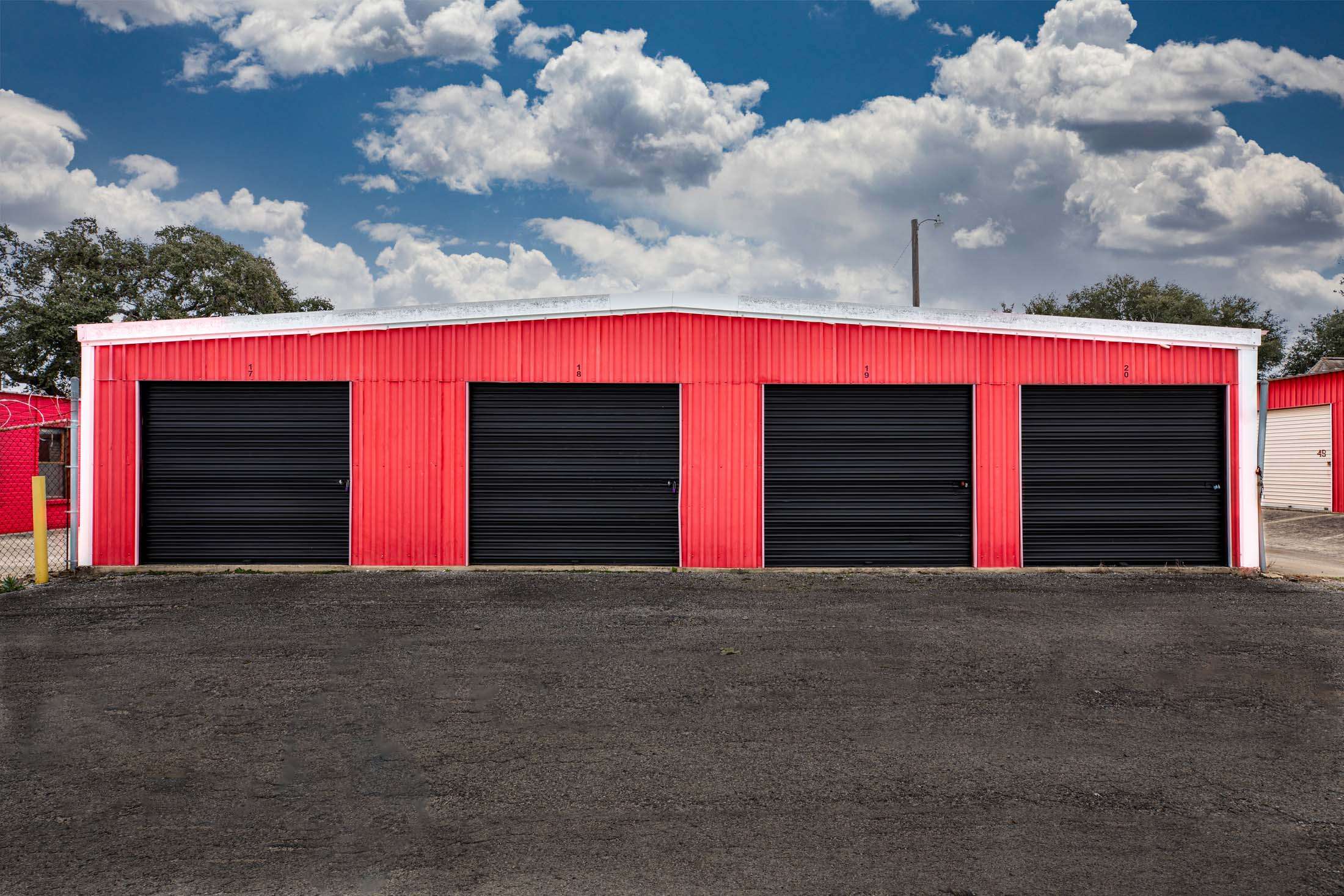 Black roll up doors on self storage units