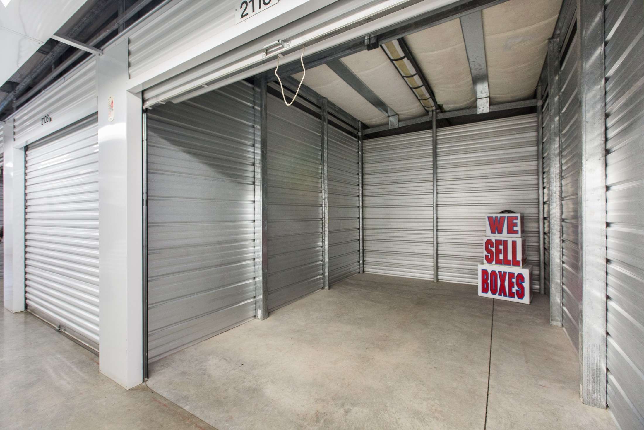 open storage unit with boxes inside