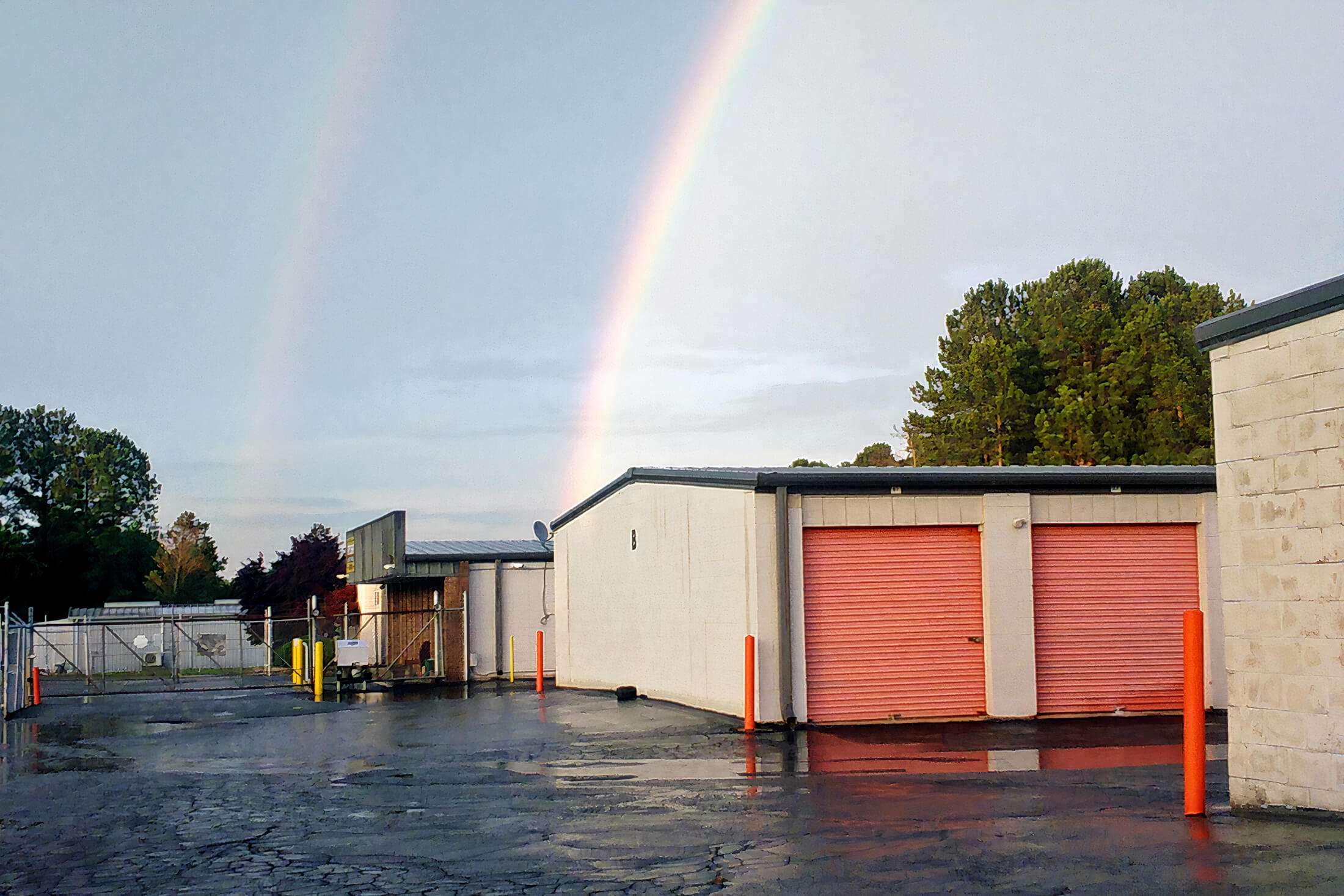 gate and buildings of drive up self storage units