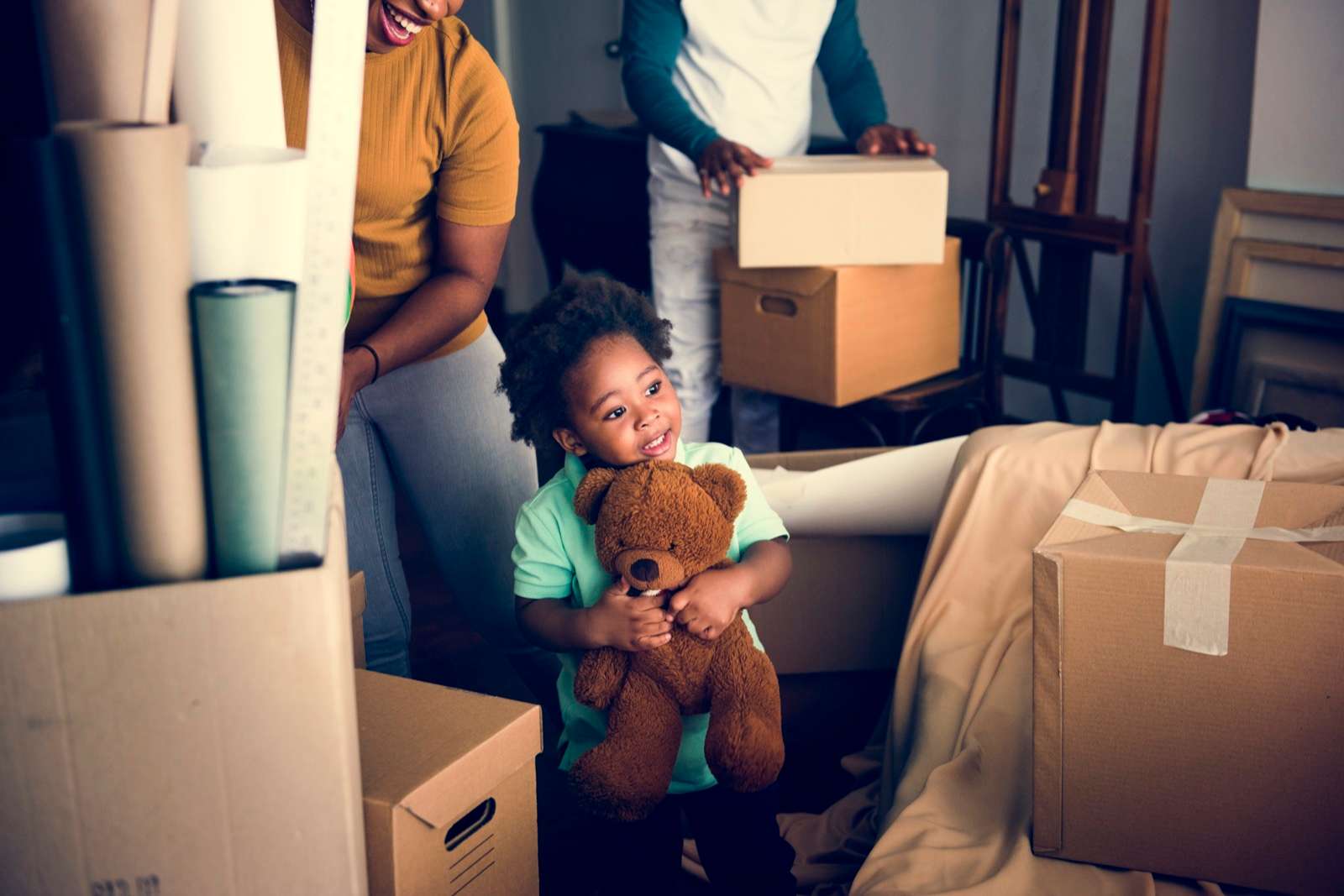Young Child Helping Family Move