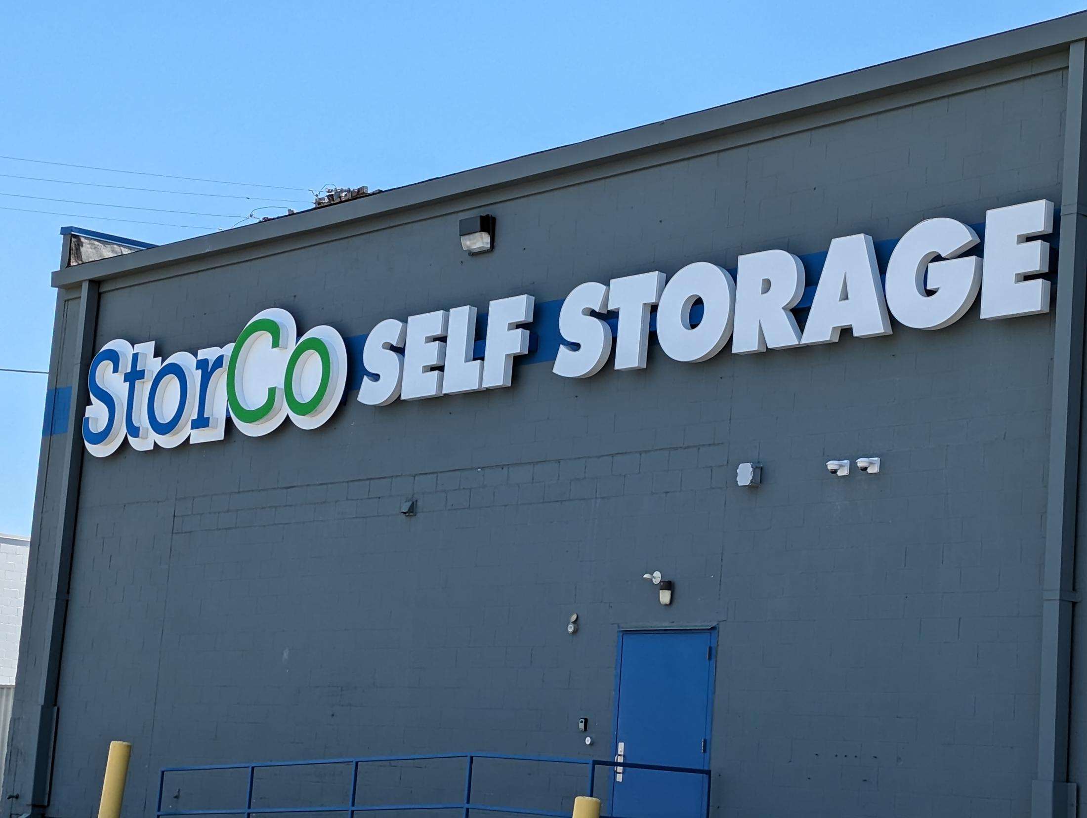 StorCo Self Storage facility signage on building