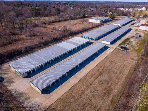Well maintained self storage units on a paved lot