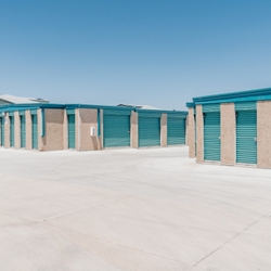 Multiple rows of drive-up self storage units