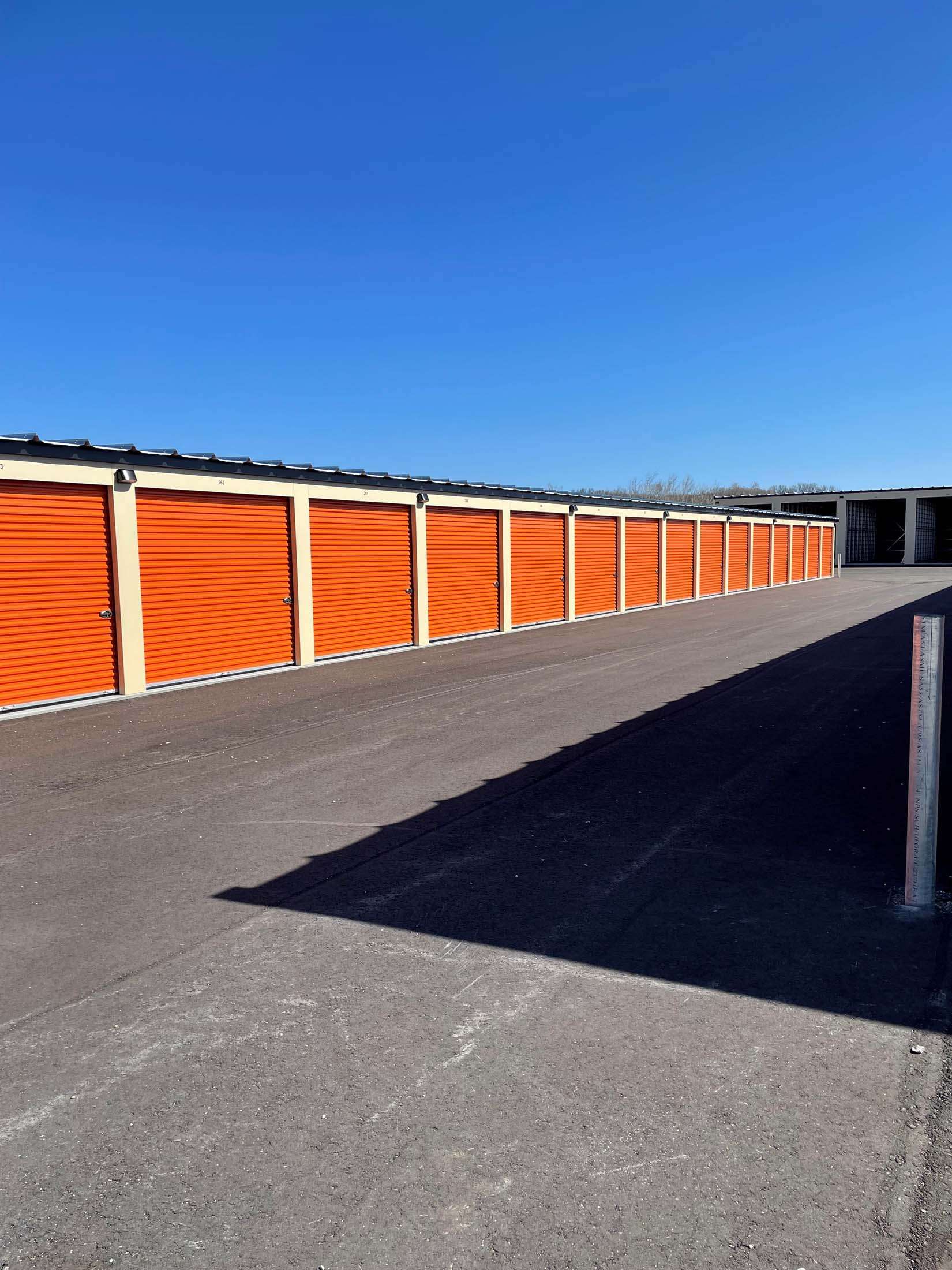 Drive up self storage units with orange doors