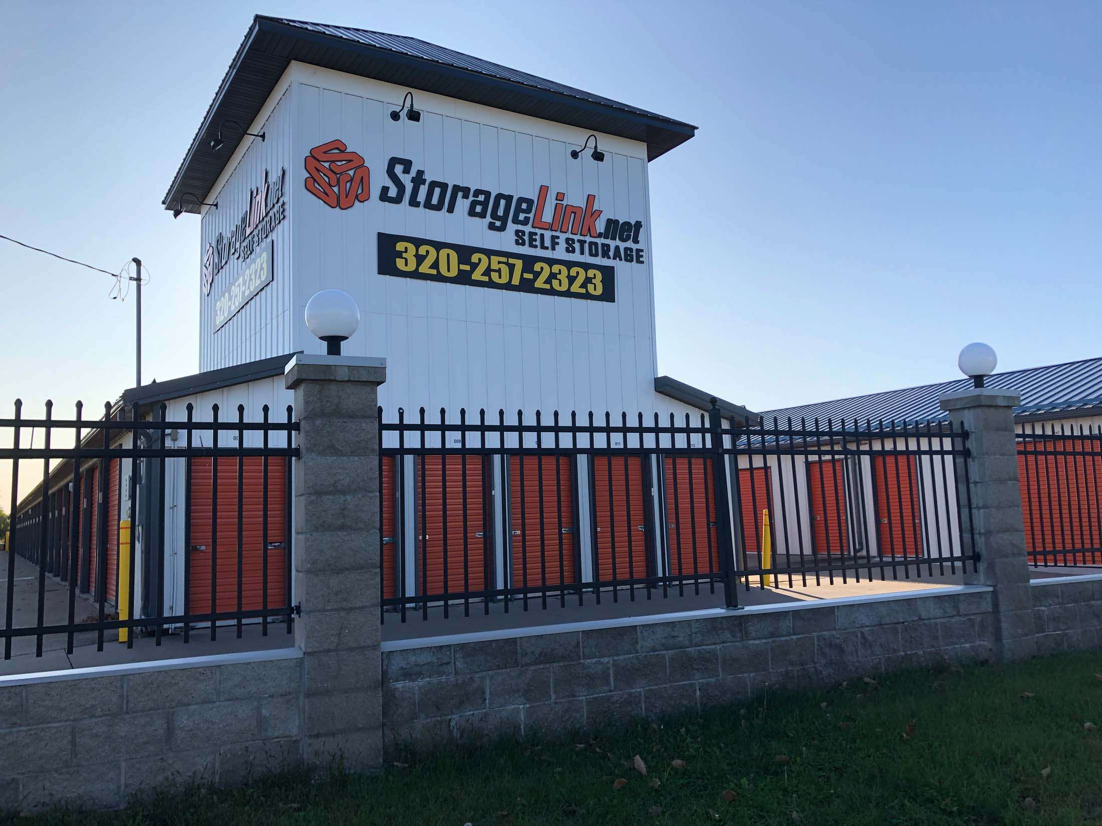 Security gate surrounding storage facility