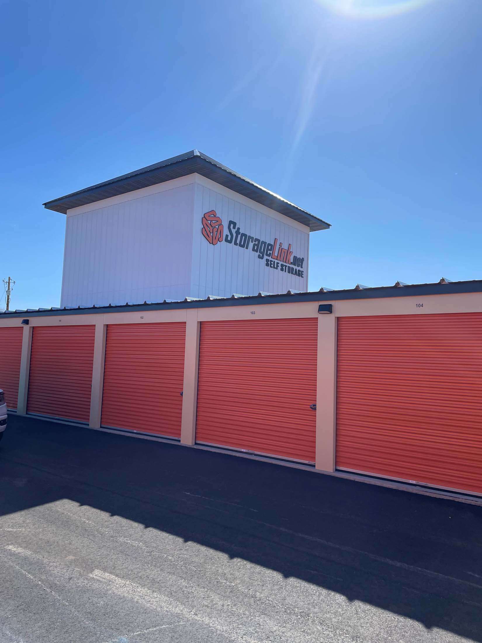 Self storage units with orange doors