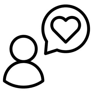 Empty outdoor storage units with roll-up doors and paved driveway in a storage facility